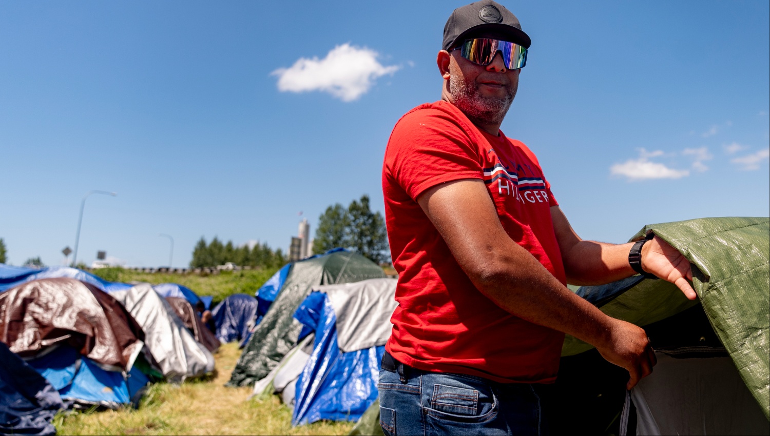 more-than-200-asylum-seekers-camp-on-land-near-highway-south-of-seattle